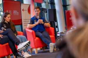 Jonathan Rea sharing his journey and insights with students, alongside WorldWCR rider Beatriz Neila.